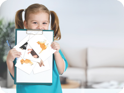 girl with picture cards on clipboard